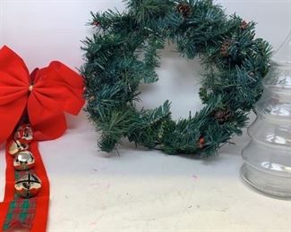 Christmas wreath, bow and bells, and glass