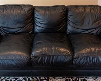 34. Black 3 Cushion Leather Sofa (89" x 35" x 36")