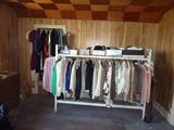 Huge rack of vintage clothing, slips, dresses and more.