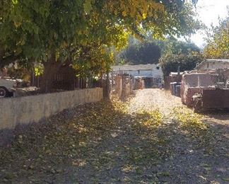 Directly across the white mailbox at 41 Ranch Road is a long driveway that leads to the estate sale property, with a low brick wall on the left.  The driveway corresponds to the location that would be 42 Ranch Road, but there is no number.  Drive down this driveway to the LaSalle's residence at 8541 N. Ventura Ave.  We will have signs so it should not be difficult to find.  