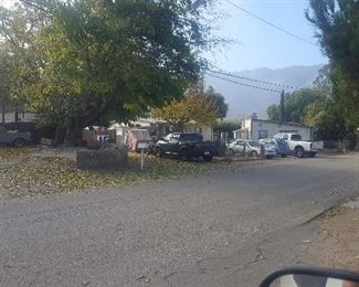 Drive down Ranch Road a short distance until you get to 41 Ranch Road.  White mailbox on the right has the number 41.  Directly across the mailbox is a long driveway that leads to the estate sale property. There is no number but the location of the driveway corresponds to the address 42 Ranch Road, Ventura, CA 93001 (Casitas Springs).