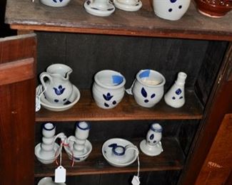 Williamsburg (VA) pottery in an assortment of shapes.
