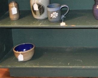 including this little bowl with blue interior made by a teenage Ben Owens III.