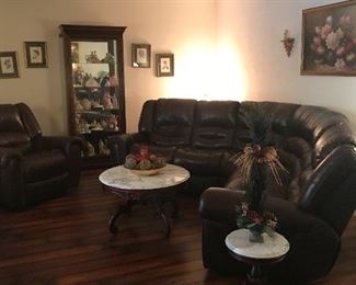 Black leather reclining pit group and oversized recliner- everything pictured goes 