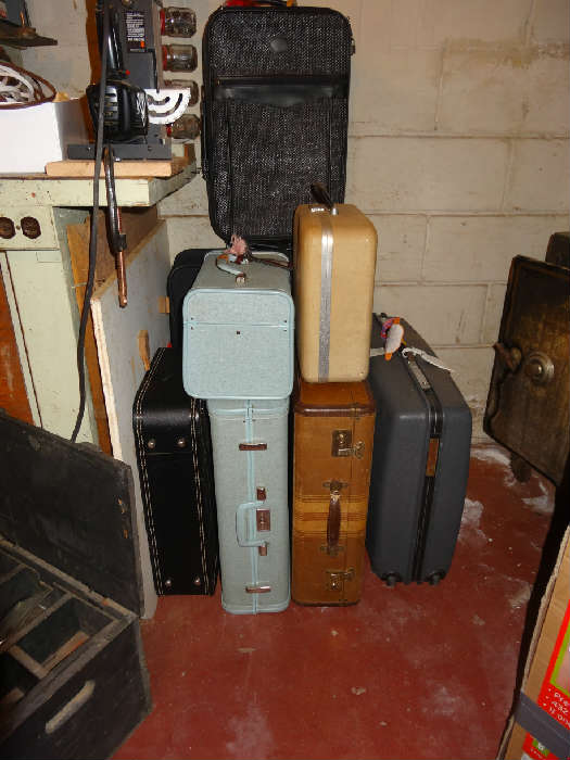 Suitcases, including vintage.