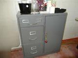 Vintage metal storage cabinet.