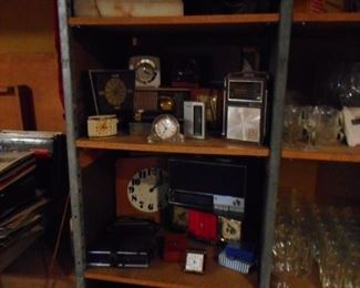 Shelf Filled with Vintage Clocks, Radios