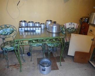 Vintage Green Wrought Iron Table with 4 Side Chairs. Top of Glass corner..need new glass 