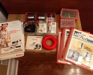 Bernina 880 plus. -$7500 - Carrying cases for machine and automated embroidery arm. Extra sets of specialized machine feet. Cases full of Bernina bobbins, thread, and accessories.
