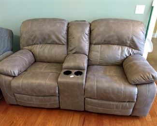 New love seat - $600 - motorized recliners and power