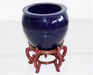 8. Ceramic Planter and Wooden Stand