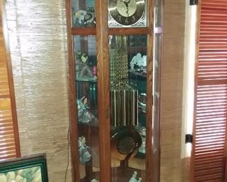 HUGE GRANDFATHER CLOCK WITH GLASS SHELVING, YOU GET THE WINDING KEY AND DOOR KEY AS WELL, REALLY NICE!