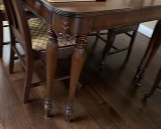 #2 antique dinning table w middle support double leg corner 6 chairs as is66x42x30  $ 199.00