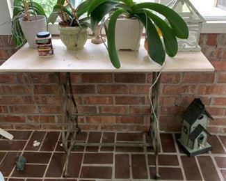 #18 sewing machine base w marble top   $ 125.00