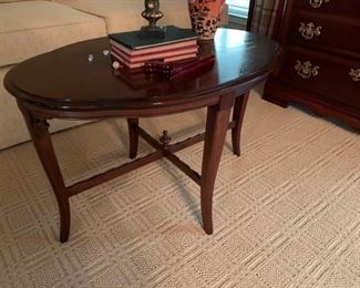 #25 oval coffee table 29x19x18  $ 100.00