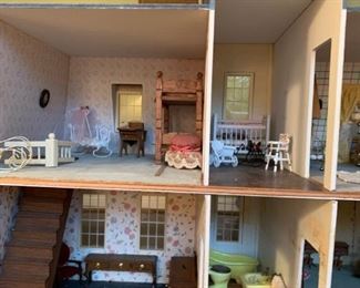 #64 doll house w stairs and floors 33x17x43  $ 500.00 #65 doll house furniture taged in bags  $ 200.00