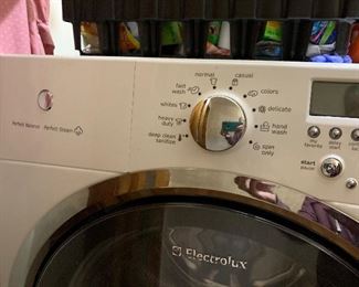 Electrolux front load washer with laundry pedestal storage drawer