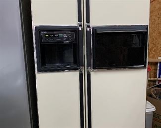 Side-by-side refrigerator with ice maker in the door