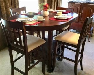 Like new pub drop leaf table with 4 chairs