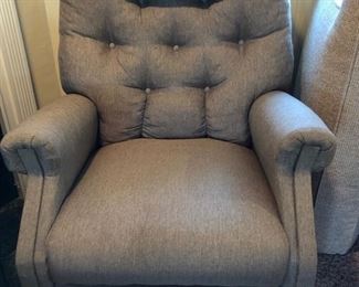 Beige tweed swivel recliner