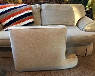 Broyhill brand beige couch w/ extra bottom cushion & a crocheted, striped afghan