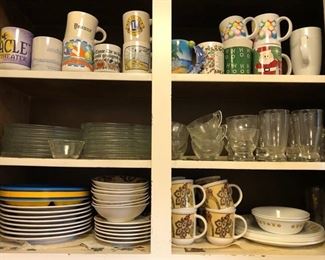 Several coffee cups, drinking glass sets, glass snack plates w/ matching cups, & dish set w/ matching cups.