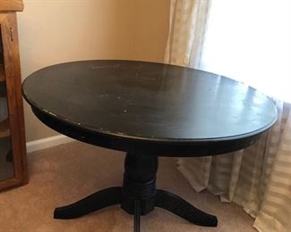 Black painted round dining room pedestal table