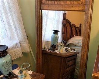 One of 2 mirrors that are part of the queen sized bedroom set.