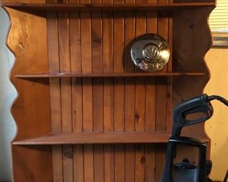 Knotted pine corner bookshelf, couple of planters,  Husky pressure washer & 1967 VW Beetle original hubcap. 