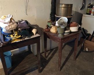 A couple of square wooden tables & odd sized planters