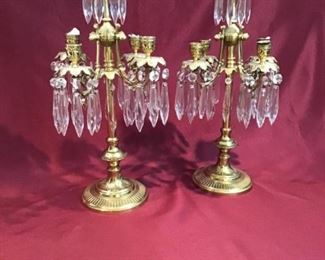 Two brass candlesticks With crystal Prisms https://ctbids.com/#!/description/share/272325