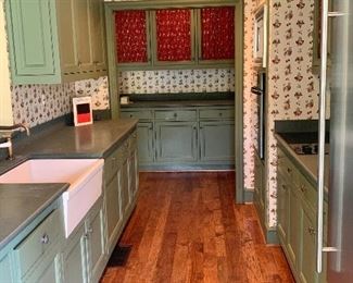 Full Kitchen Includes Inset Door Cabinets, Countertops, Farmhouse Sink, Sub-Zero Refrigerator, Cooktop, Single Wall Oven and Microwave.