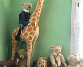 Steiff giraffe, lion and bears.