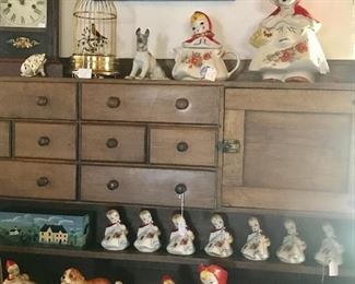 Absolutely adorable Red Riding-hood set. Spices, cookie jar, creme and sugar....etc
Antique clock and an amazing 1920s German automaton bird!