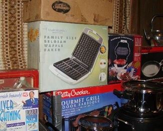 Belgian waffle maker, Betty Crocker indoor barbecue, silver tarnish remover, pots and pans