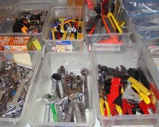 Variety of tools (Wrenches, pliers, socket wrenches, box cutters, tape measures, wire cutters)