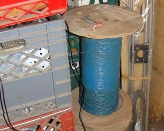 Blue wire, different colored crates