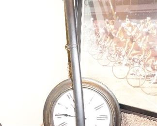 Sword, clock, bike picture