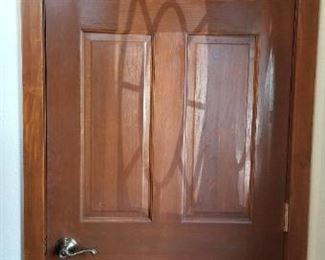 Solid wood six-panel interior doors throughout