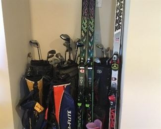 skis and golf clubs
