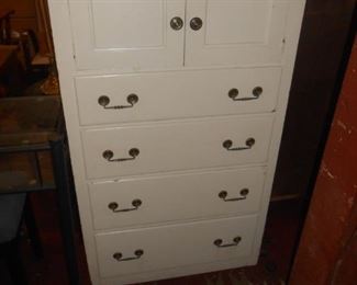 This chest has 2-doors at the top and 4 drawers below and is about 15" deep.