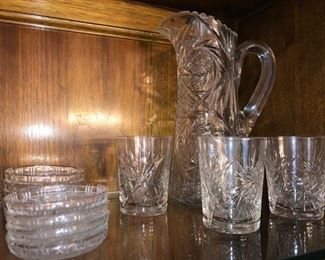Cut crystal glasses and pitcher