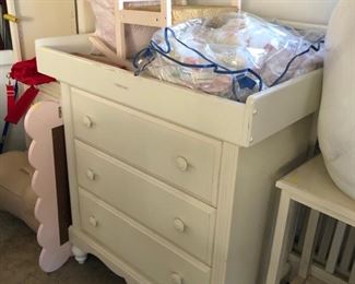 White chest of drawers and changing table