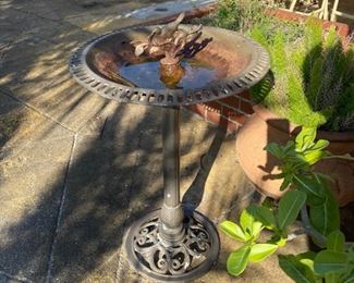Metal bird bath