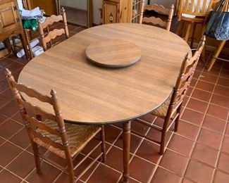 Great table with extra leaves and Lazy Susan.