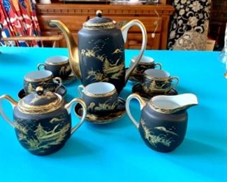 Vintage Japanese black gilded gold porcelain tea set.