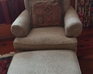 Neutral color club chair and ottoman