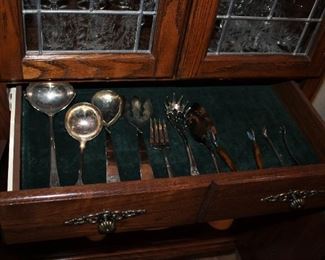 Sterling silver serving utensils.