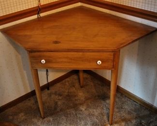 Corner wooden table (nice).