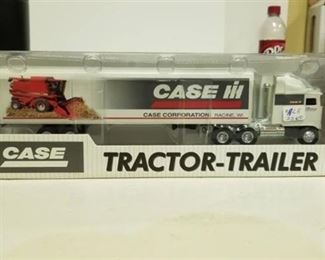 Case IH tractor trailer with combine pic on trailer